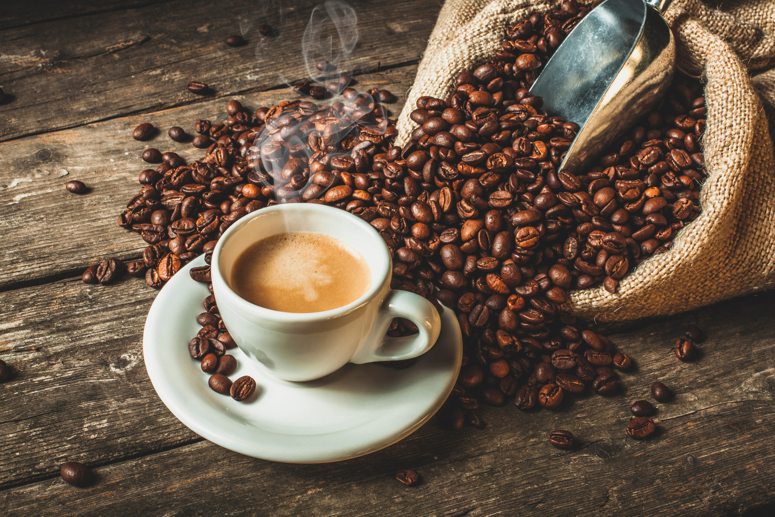 Coffee cup and roasted coffee beans