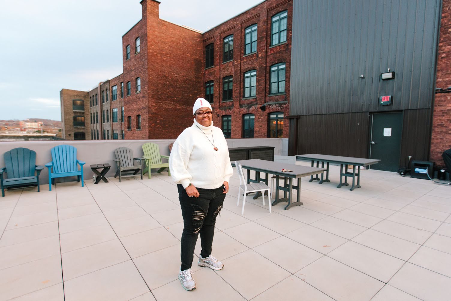 A Mission staff member on the rooftop patio